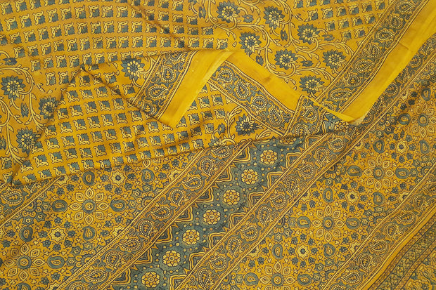 Modal silk saree in ajrakh block print in yellow  in floral pattern