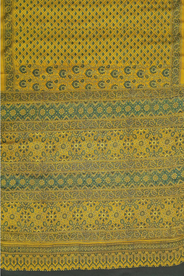 Modal silk saree in ajrakh block print in yellow  in floral pattern