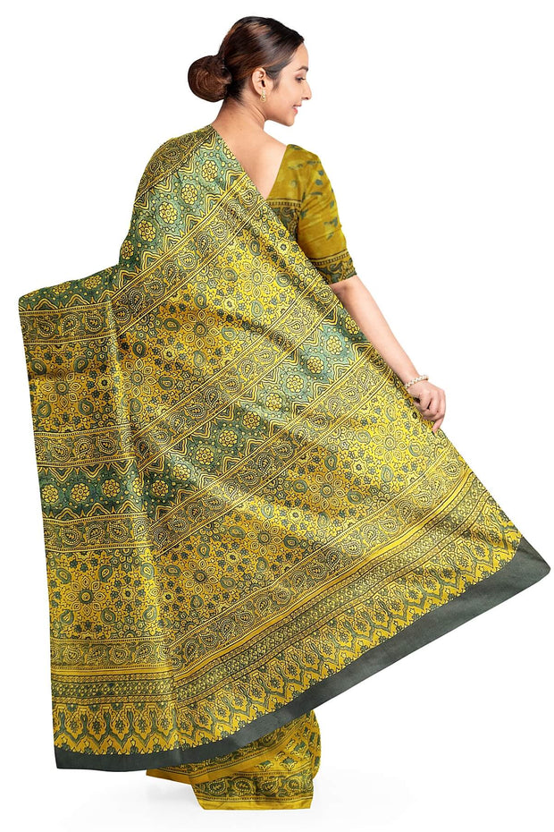 Modal silk saree in ajrakh block print in yellow  in floral pattern
