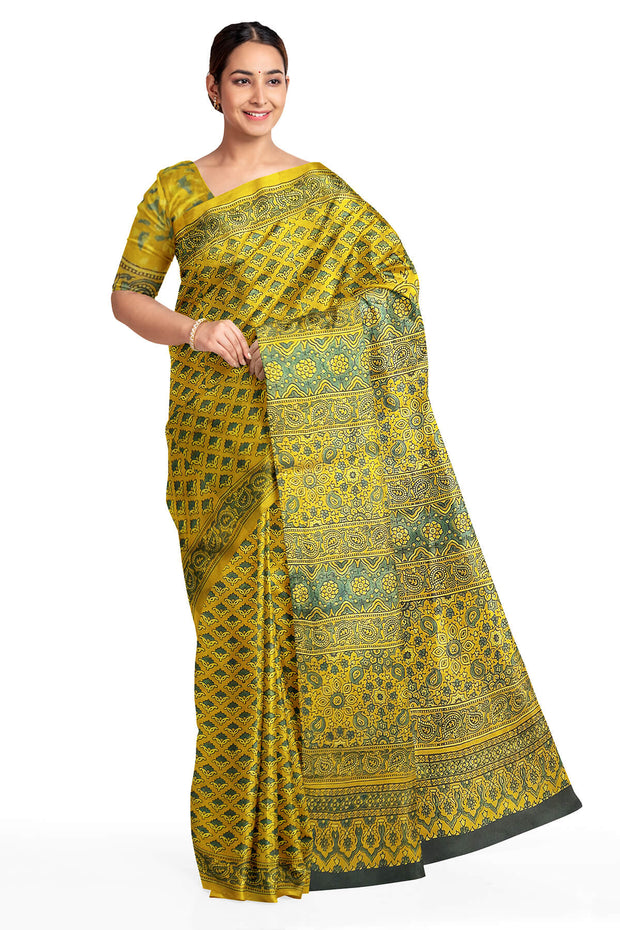 Modal silk saree in ajrakh block print in yellow  in floral pattern