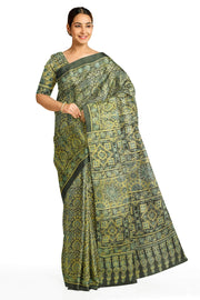 Modal silk saree in ajrakh block print in black & green  in floral pattern