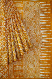 Modal silk saree in floral print in mustard