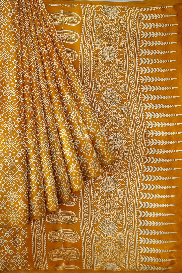 Modal silk saree in floral print in mustard