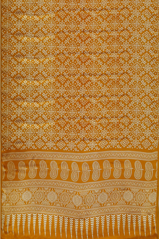 Modal silk saree in floral print in mustard