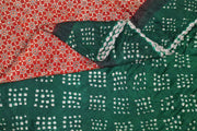 Modal silk saree in red in hand block ajrakh  print with bandini pallu & blouse in green