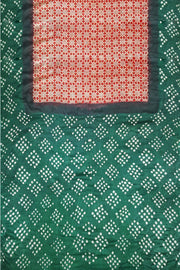 Modal silk saree in red in hand block ajrakh  print with bandini pallu & blouse in green