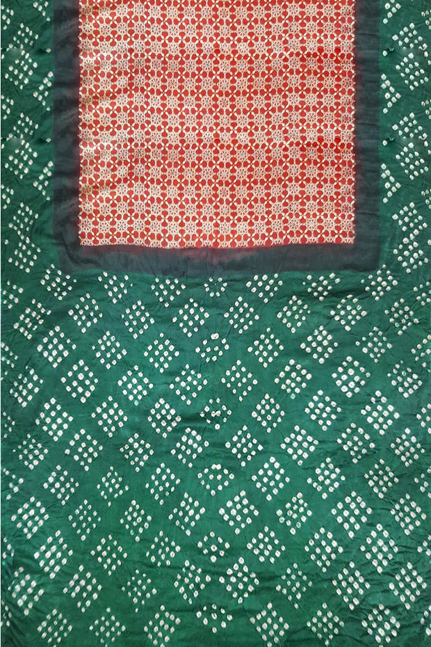 Modal silk saree in red in hand block ajrakh  print with bandini pallu & blouse in green