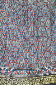 Modal silk saree in blue  in hand block ajrakh print in floral pattern