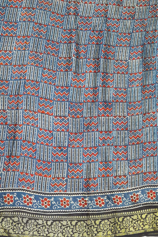 Modal silk saree in blue  in hand block ajrakh print in floral pattern