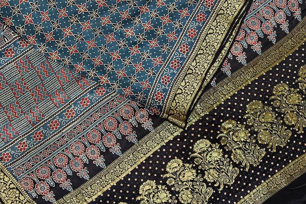 Modal silk saree in blue  in hand block ajrakh print in floral pattern