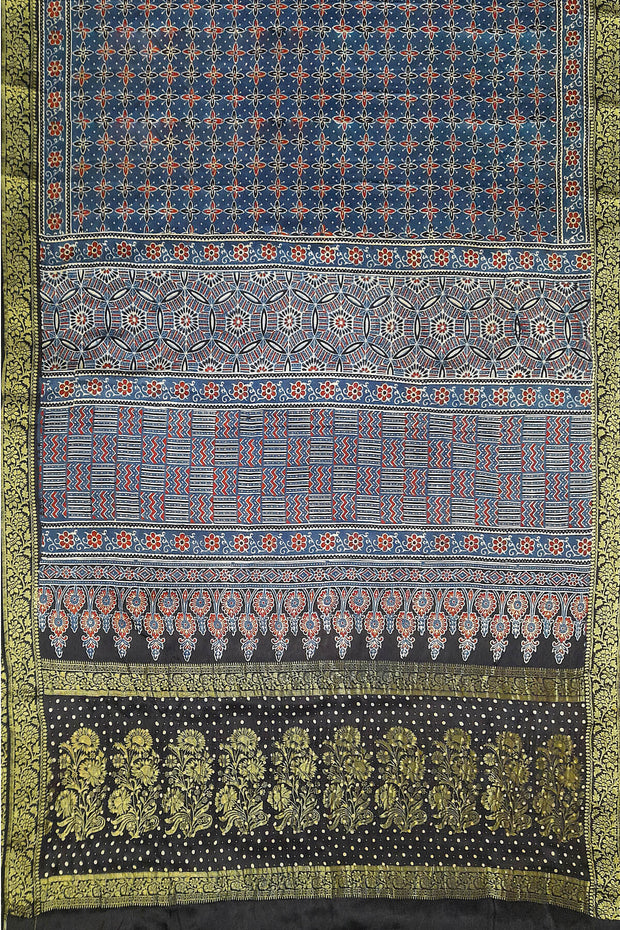 Modal silk saree in blue  in hand block ajrakh print in floral pattern