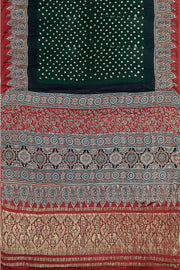 Modal silk bandini saree in bottle green  with nakshi pallu