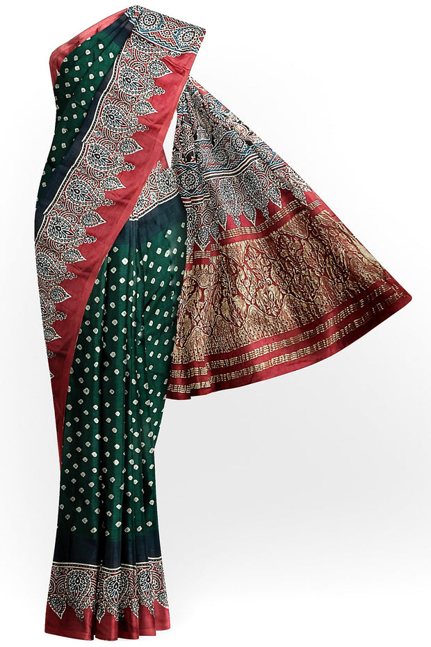 Modal silk bandini saree in bottle green  with nakshi pallu