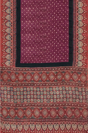 Modal silk bandini saree in burgundy  with hand block ajrakh print