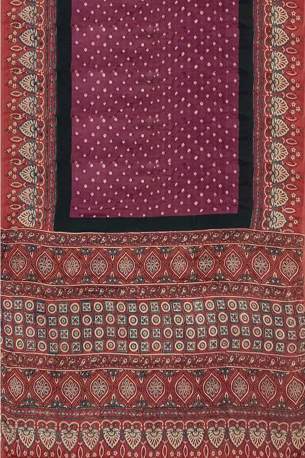 Modal silk bandini saree in burgundy  with hand block ajrakh print