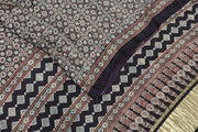 Modal silk saree in black with small motifs  in hand block ajrakh print