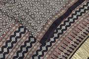 Modal silk saree in black with small motifs  in hand block ajrakh print