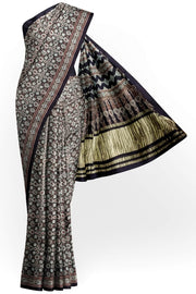 Modal silk saree in black with small motifs  in hand block ajrakh print