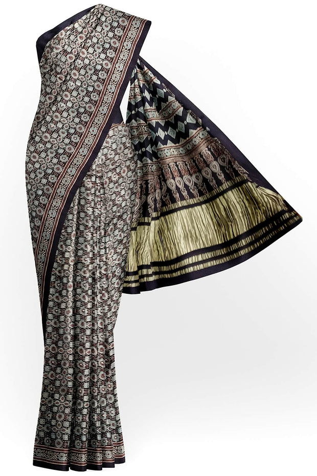 Modal silk saree in black with small motifs  in hand block ajrakh print