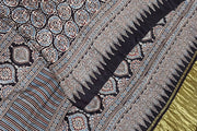 Modal silk saree in black with round motifs  in hand block ajrakh print