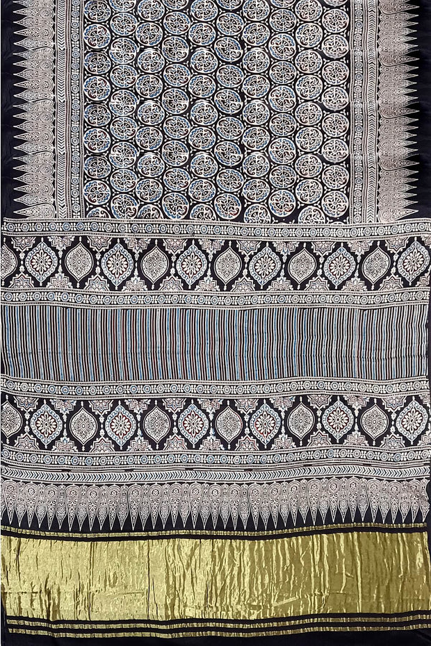 Modal silk saree in black with round motifs  in hand block ajrakh print