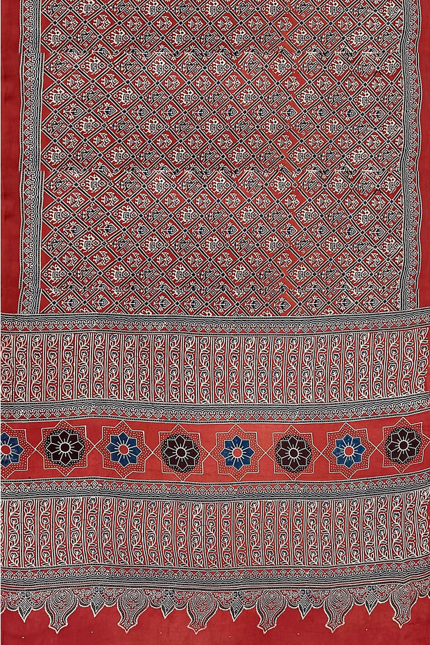 Modal silk saree in red with  narikunj pattern in hand block ajrakh print