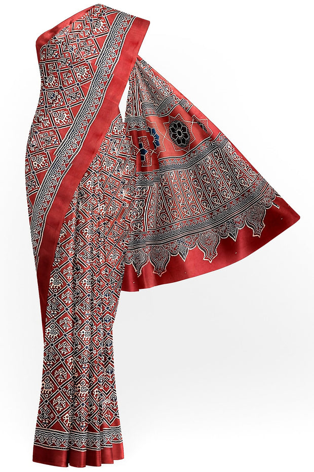Modal silk saree in red with  narikunj pattern in hand block ajrakh print