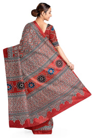 Modal silk saree in red with  narikunj pattern in hand block ajrakh print