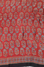Modal silk saree in red with floral motifs  in hand block ajrakh print and a tissue pallu