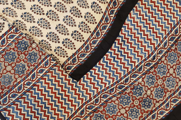 Modal silk saree in off white with plant motifs in hand block ajrakh print