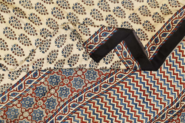 Modal silk saree in off white with plant motifs in hand block ajrakh print