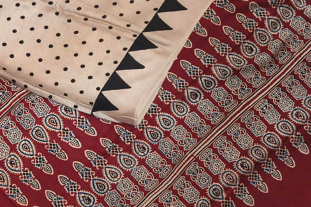 Modal silk saree in off white with small round motifs in hand block ajrakh print