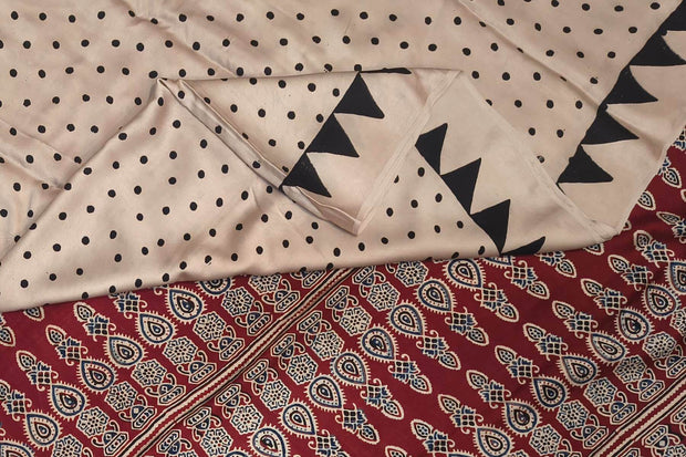Modal silk saree in off white with small round motifs in hand block ajrakh print