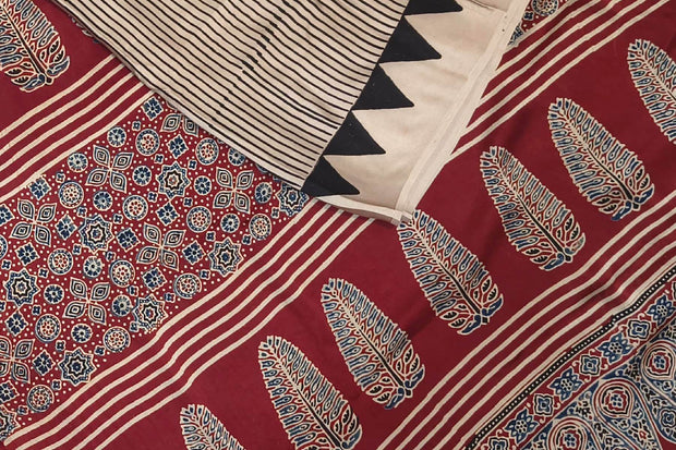 Modal silk saree  in cream with  stripes in hand block Ajrakh print.