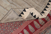 Modal silk saree  in cream with  stripes in hand block Ajrakh print.