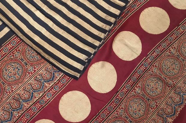 Modal silk saree in cream with stripes  and hand block print ajrakh pallu