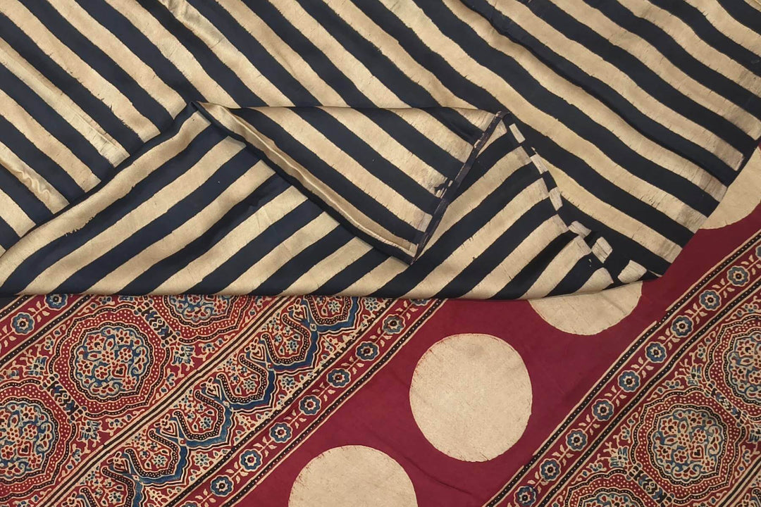 Modal silk saree in cream with stripes  and hand block print ajrakh pallu