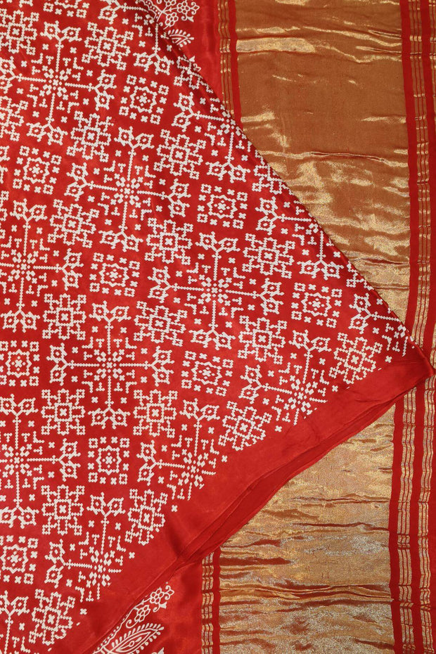 Modal silk saree in rangoli pattern in red with lagda patti (zari)  pallu