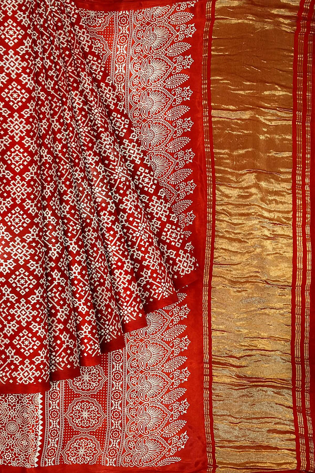Modal silk saree in rangoli pattern in red with lagda patti (zari)  pallu