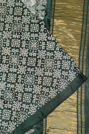 Modal silk saree in rangoli pattern in bottle green with lagda patti (zari)  pallu