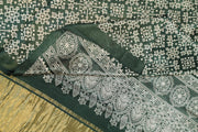 Modal silk saree in rangoli pattern in bottle green with lagda patti (zari)  pallu