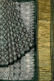 Modal silk saree in rangoli pattern in bottle green with lagda patti (zari)  pallu