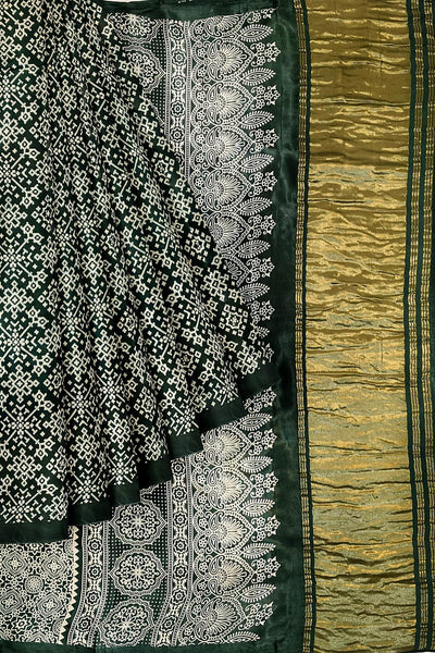 Modal silk saree in rangoli pattern in bottle green with lagda patti (zari)  pallu