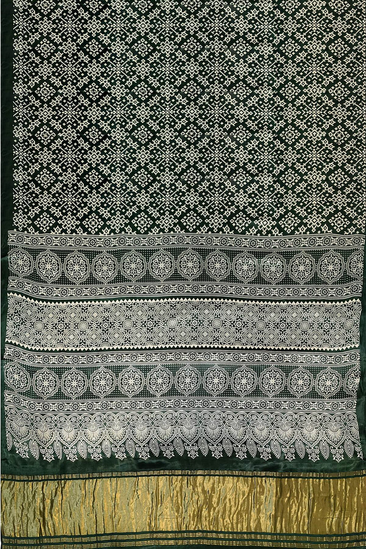 Modal silk saree in rangoli pattern in bottle green with lagda patti (zari)  pallu