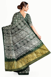 Modal silk saree in rangoli pattern in bottle green with lagda patti (zari)  pallu