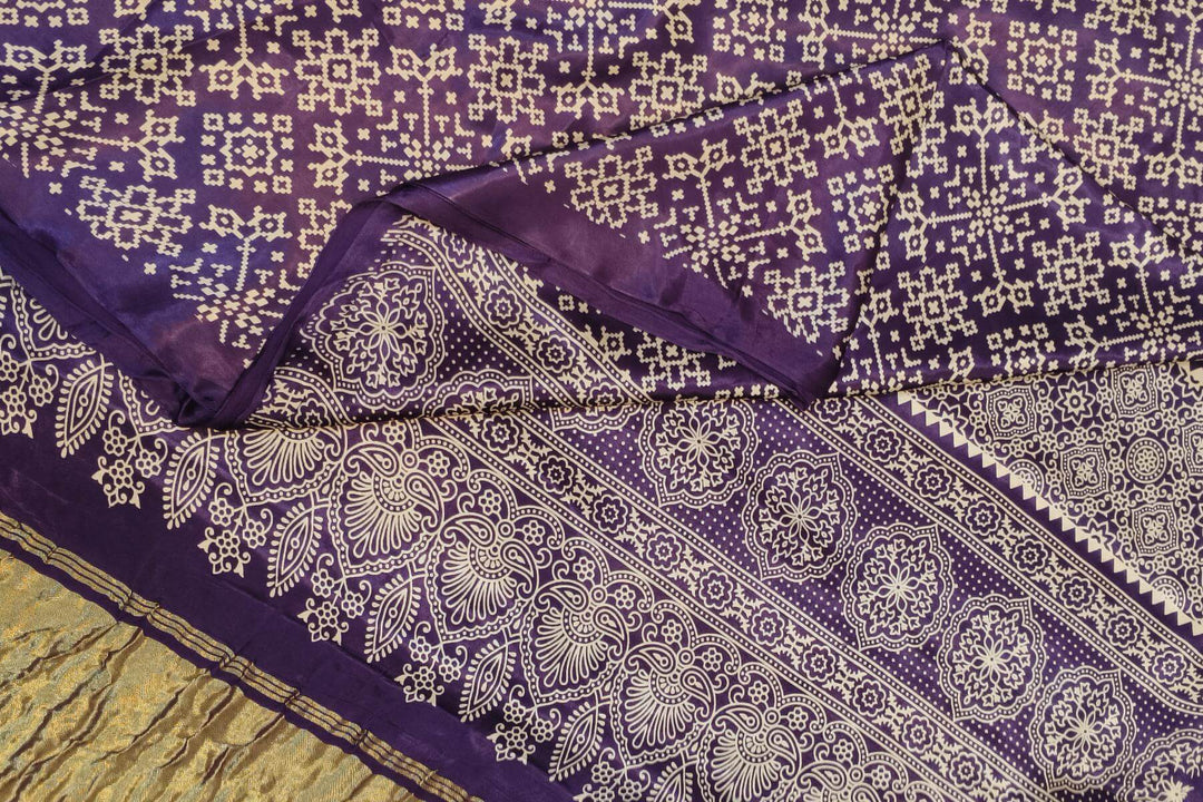 Modal silk saree in rangoli pattern in violet with lagda patti (zari)  pallu
