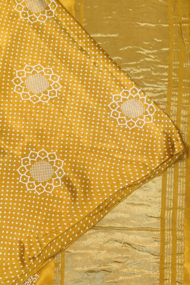 Modal silk saree in floral pattern in mustard with lagda patti (zari)  pallu