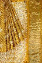 Modal silk saree in floral pattern in mustard with lagda patti (zari)  pallu