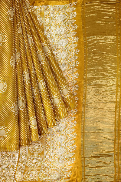 Modal silk saree in floral pattern in mustard with lagda patti (zari)  pallu