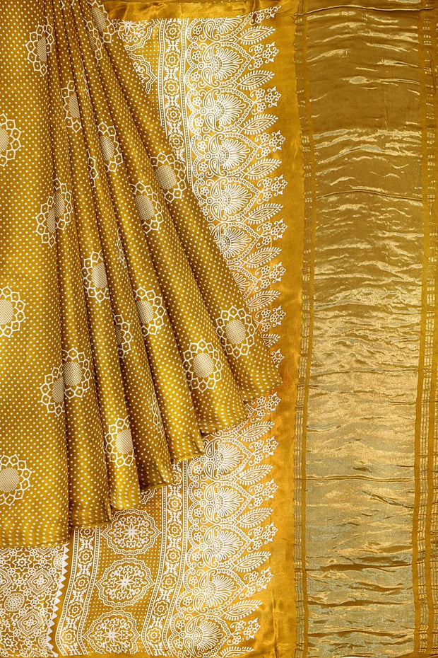 Modal silk saree in floral pattern in mustard with lagda patti (zari)  pallu